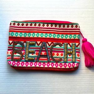 “Beach” pouch with pink tassel withpretty print